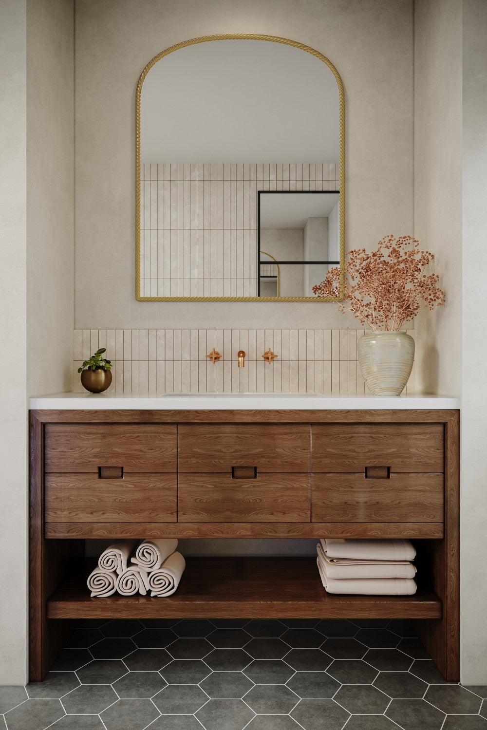 a big arch metal wall mirror above a sink with wooden storage in a bathrooom