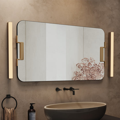 a frameless rectangle mirror in a bathroom